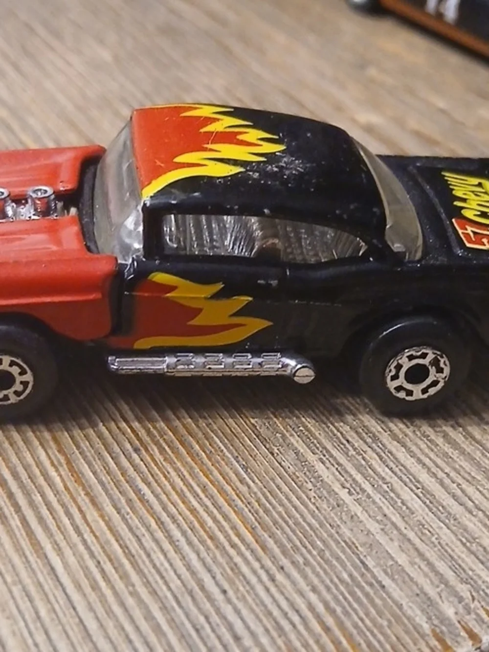 1983 Matchbox MB-4 1957 Chevy Bel Air Hardtop Black w/Red/Yellow Flames 1:64 NM